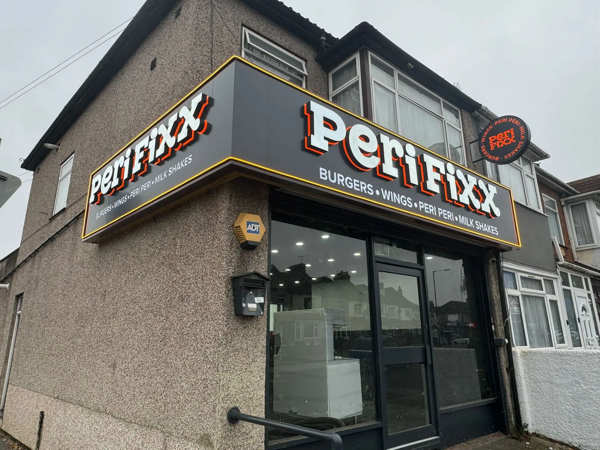 Custom signage designed for Perfixx by Sign Architects Custom sign design for Perfixx featuring bold and eye-catching branding