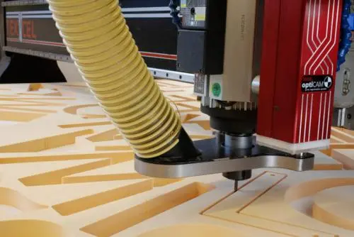 Tekcel CNC Router used by Sign Architects for precise material cutting Tekcel CNC Router cutting wood with precision at Sign Architects