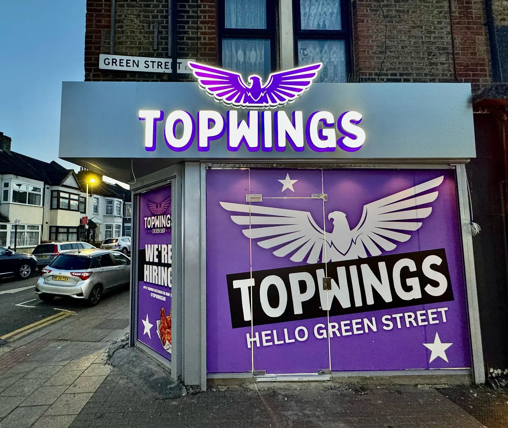 Push Through Illuminated Signage – High-End Shopfront Sign by Sign Architects Push through acrylic letter signage with internal LED face and side glow – premium shop sign example (illustrative image)