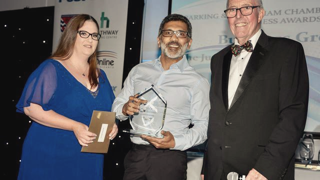 CEO Imran Haidar receiving the Barking & Dagenham Chamber of Commerce Business Growth Award in 2022